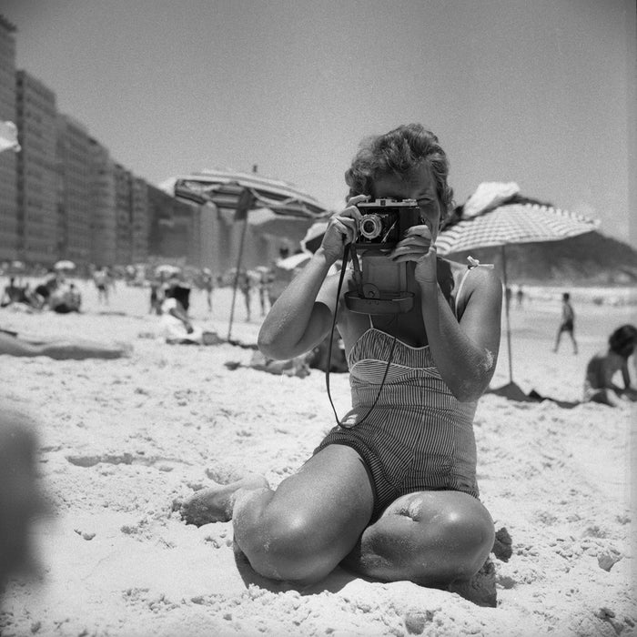 Woman with camera, 1957